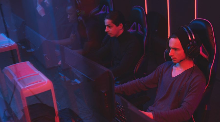 E-sport players in gaming cairs